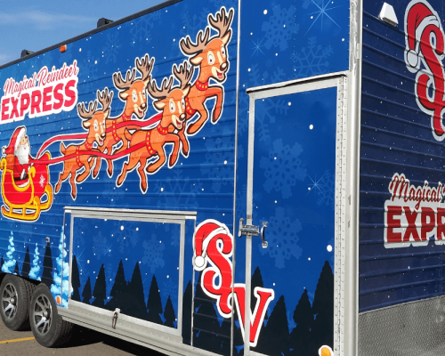 blue car trailer with reindeer